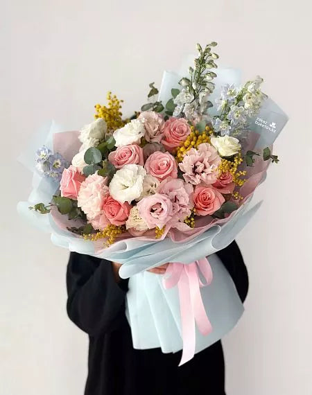 Flower bouquet "Heavenly Harmony" with rose, lisianthus, delphinium and mimosa