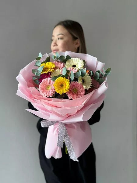 Flower bouquet of 11 gerberas with eucalyptus