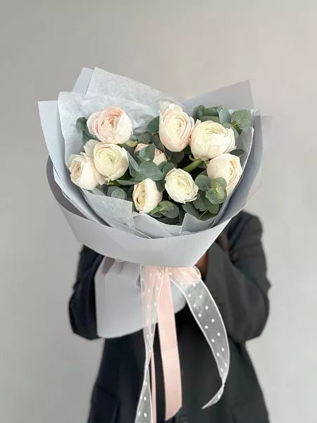 Flower bouquet "Blooming smile" with ranunculus and eucalyptus