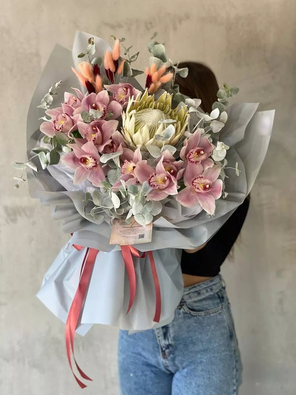 Flower bouquet "Grey" with orchid and protea