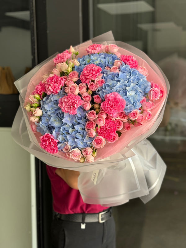 Flower bouquet "Pasha Aura" with hydrangea, carnation and spray rose