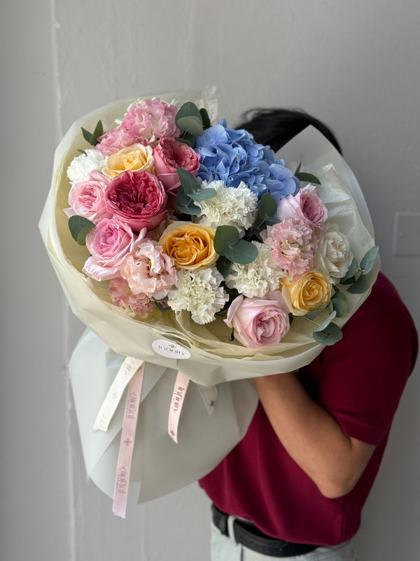 Flower bouquet "Rainbow Candy" with hydrangea, peony rose and lisianthus