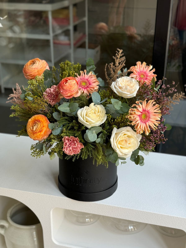 Flower bouquet "Rania" with ranunculus, peony rose and carnation