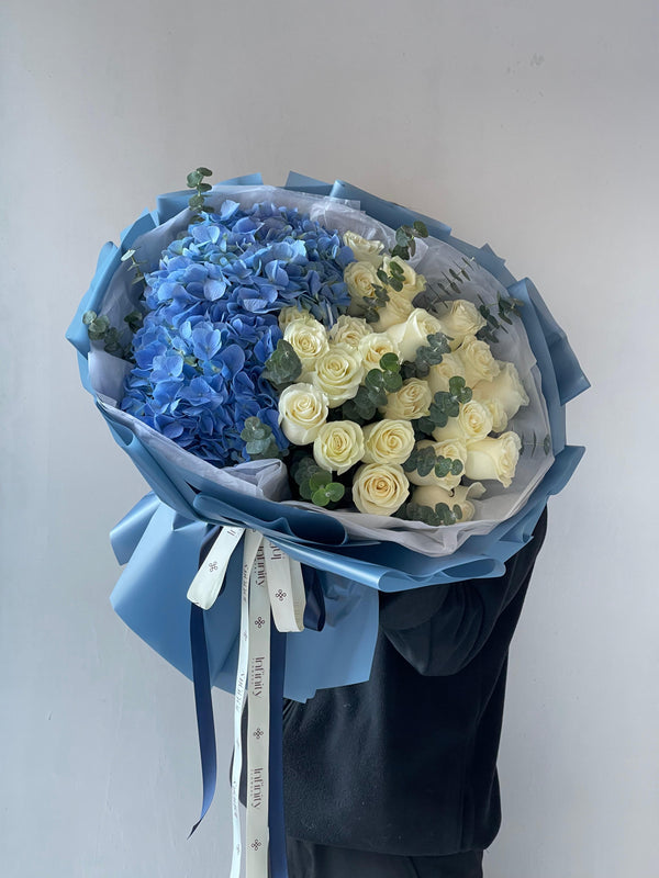 Flower bouquet "Winter Sea" with hydrangea, rose and eucalyptus