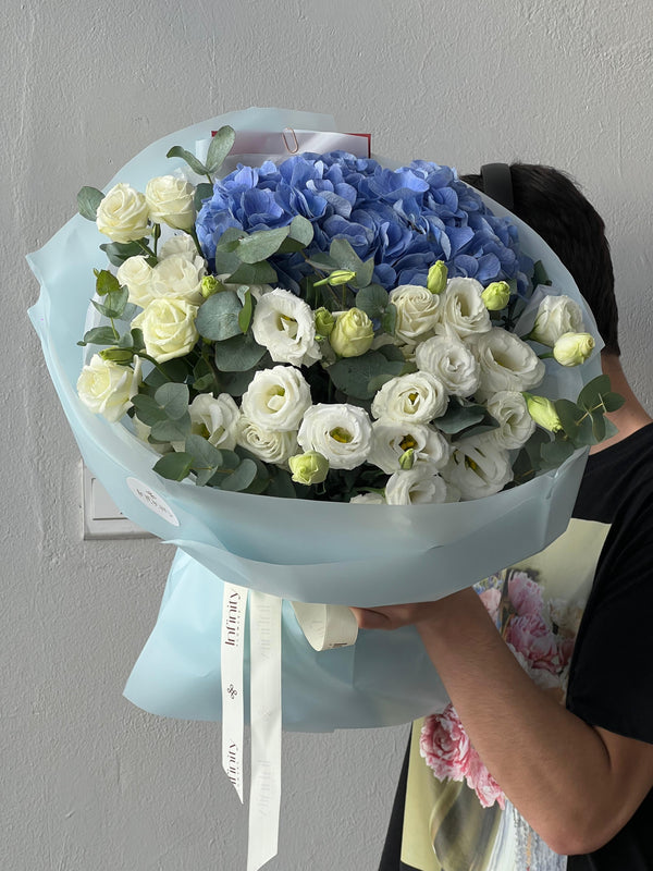 Flower bouquet "Sky" with hydrangea, lisianthus and eucalyptus