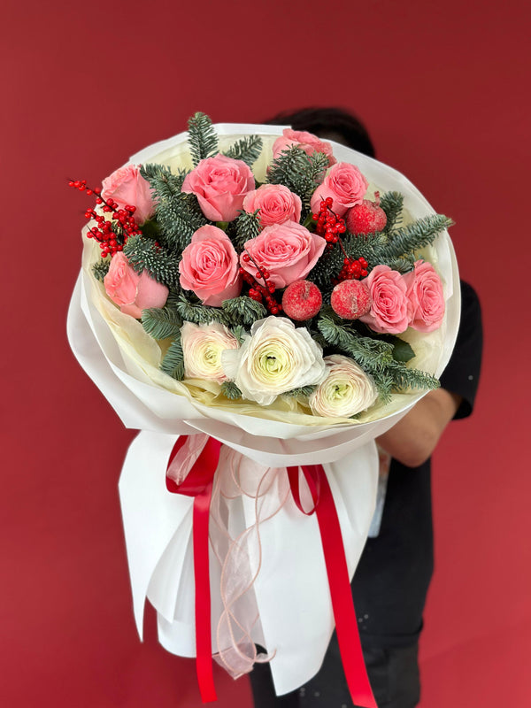 Flower bouquet "Holiday Haven" with nobilis, rose, Christmas toys and ranunculus