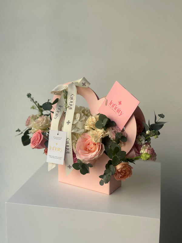 Flower bag with hydrangea and rose