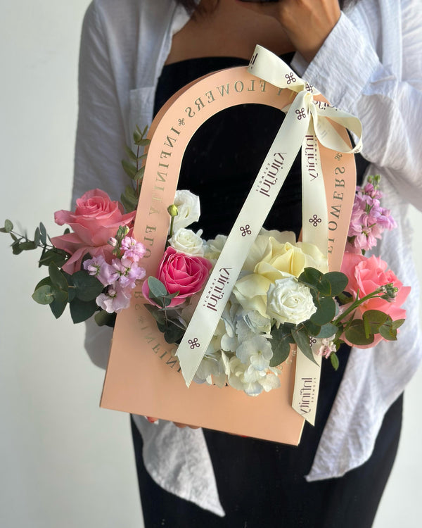 Flower bag with hydrangea and rose
