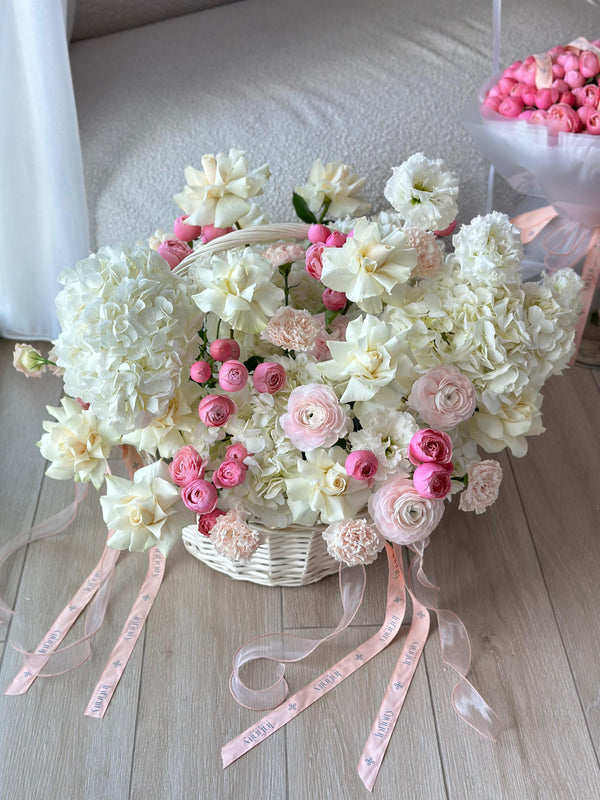 Flower basket "Ivory Dream" with hydrangea, rose, ranunculus and peony rose