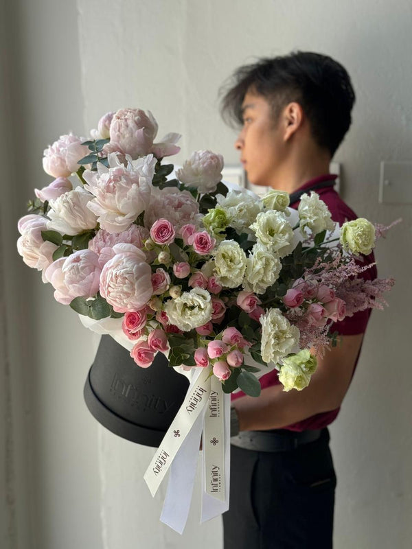 Flower bouquet "Spring Radiance" with peony, spray rose and lisianthus